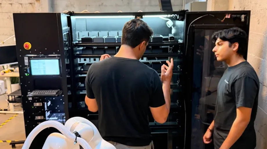 Builders integrating automated storage with a robotic lab bench